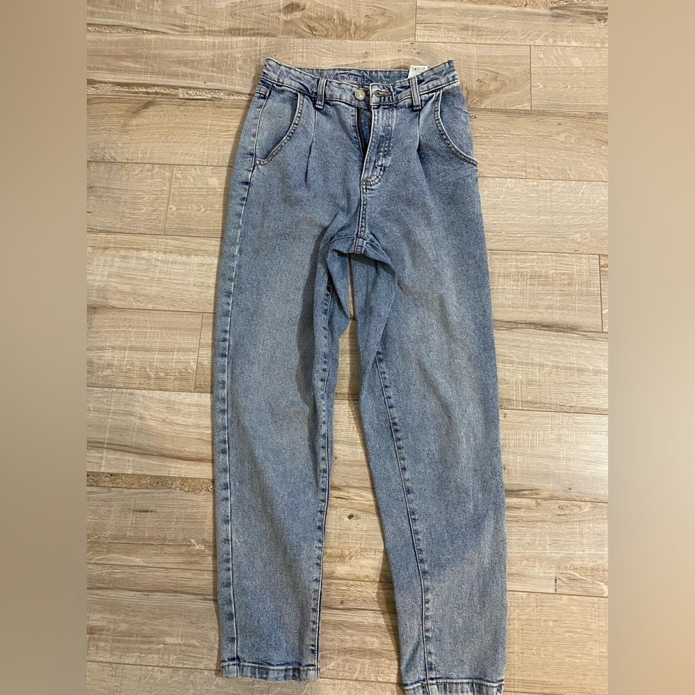 Blue jeans, size 24. Defrost